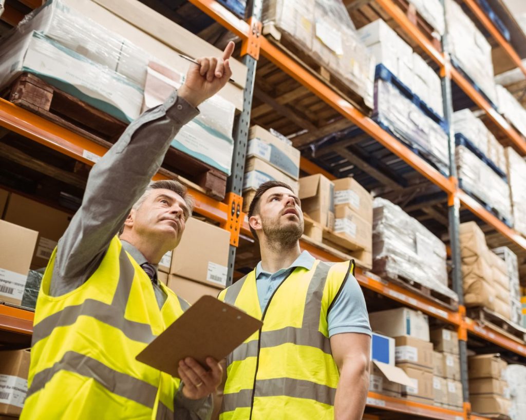 warehouse workers managing inventory